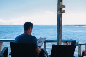 Read business books on a quiet beach with a breeze