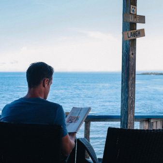 Read business books on a quiet beach with a breeze
